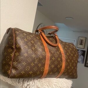 AUTHENTIC 
Louis Vuitton ClassicSPEEDY 50